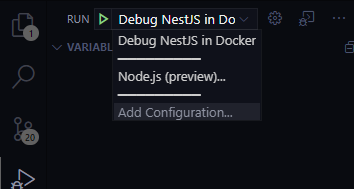 VS Code debug toolbar showing the named attach configuration